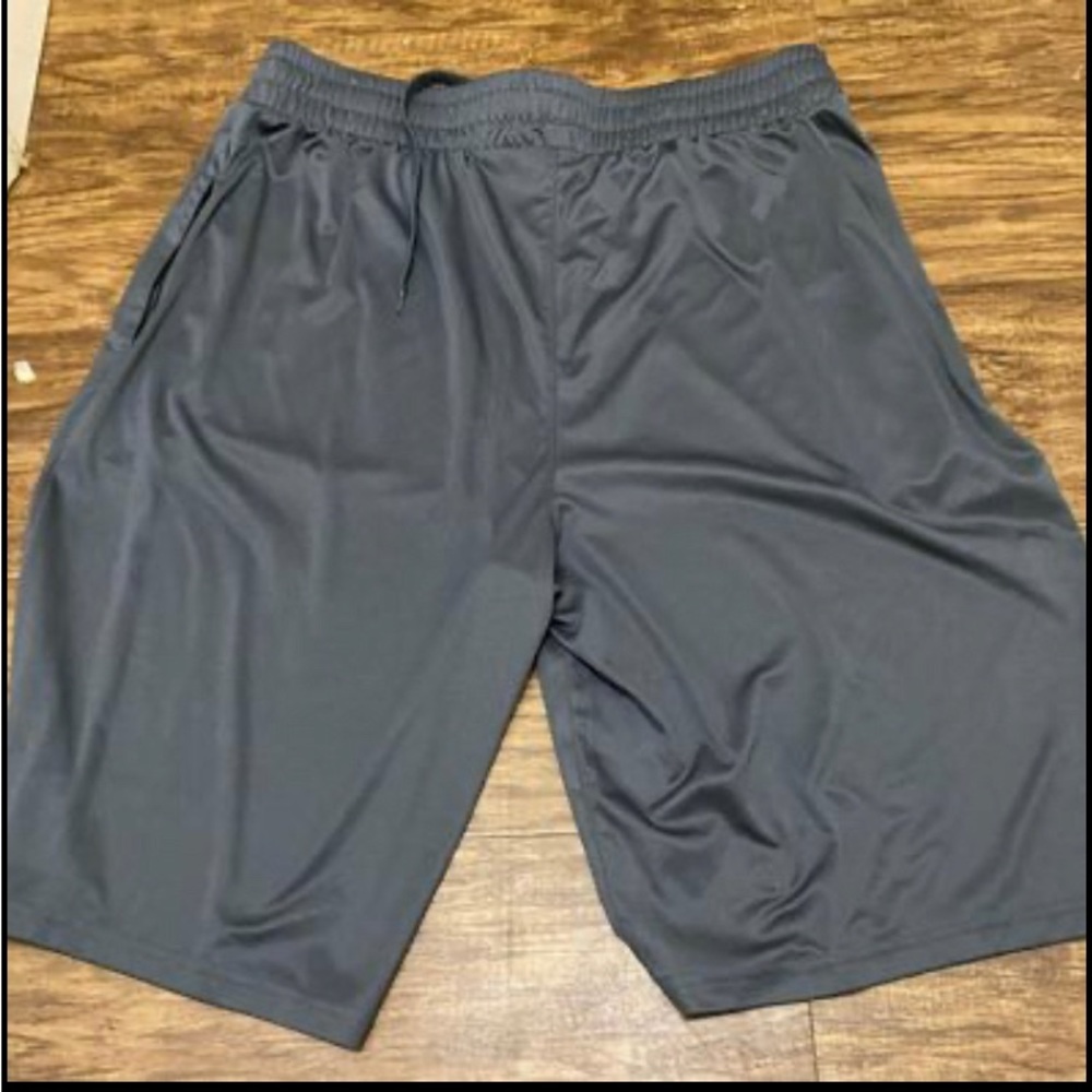 Piqidiq basketball shorts,gently used with zipper pockets and drawstring waist.